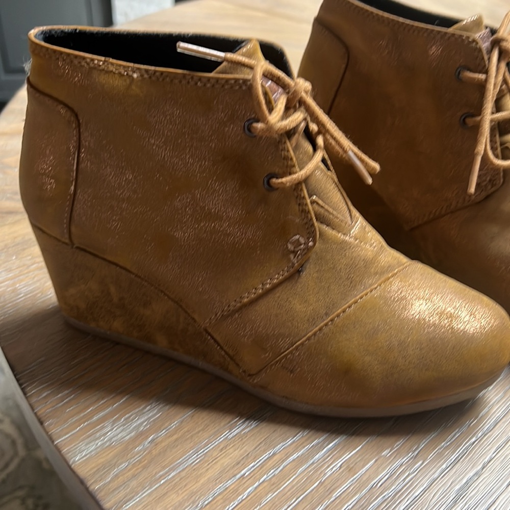 Gold brushed suede Tom’s booties. Near perfect condition. Women’s size 8.5.